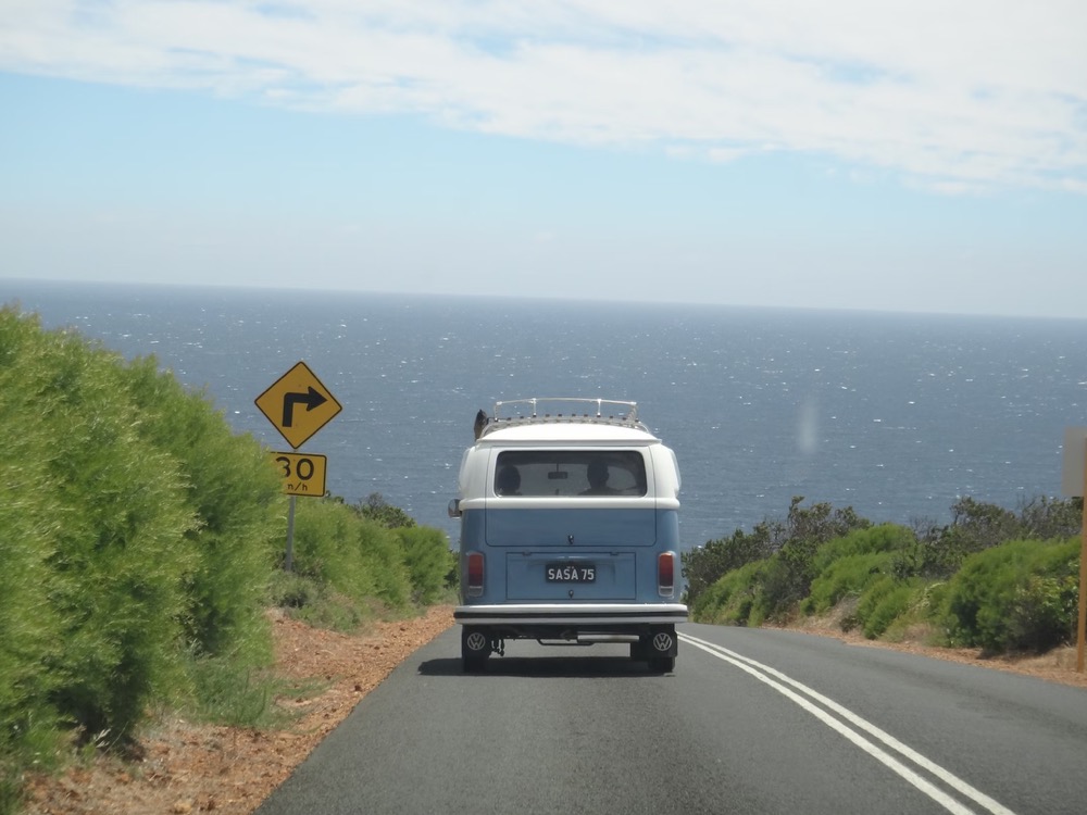 Travelers enjoying vanlife Australia along the Great Ocean Road with ocean views