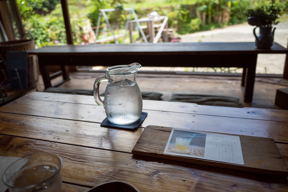 Traveler journaling at a remote cabin during JOMO travel Australia retreat