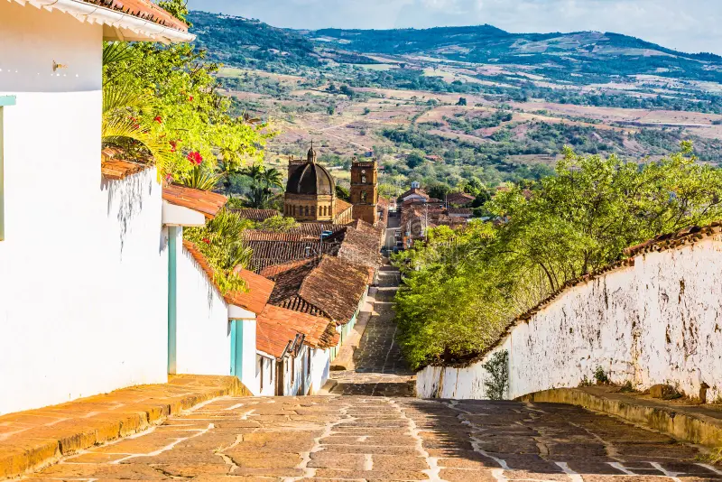 The cobblestone streets and terracotta rooftops create an enchanting setting for your Barichara Colombia 5 Day Itinerary, where colonial charm meets breathtaking Andean landscapes.
