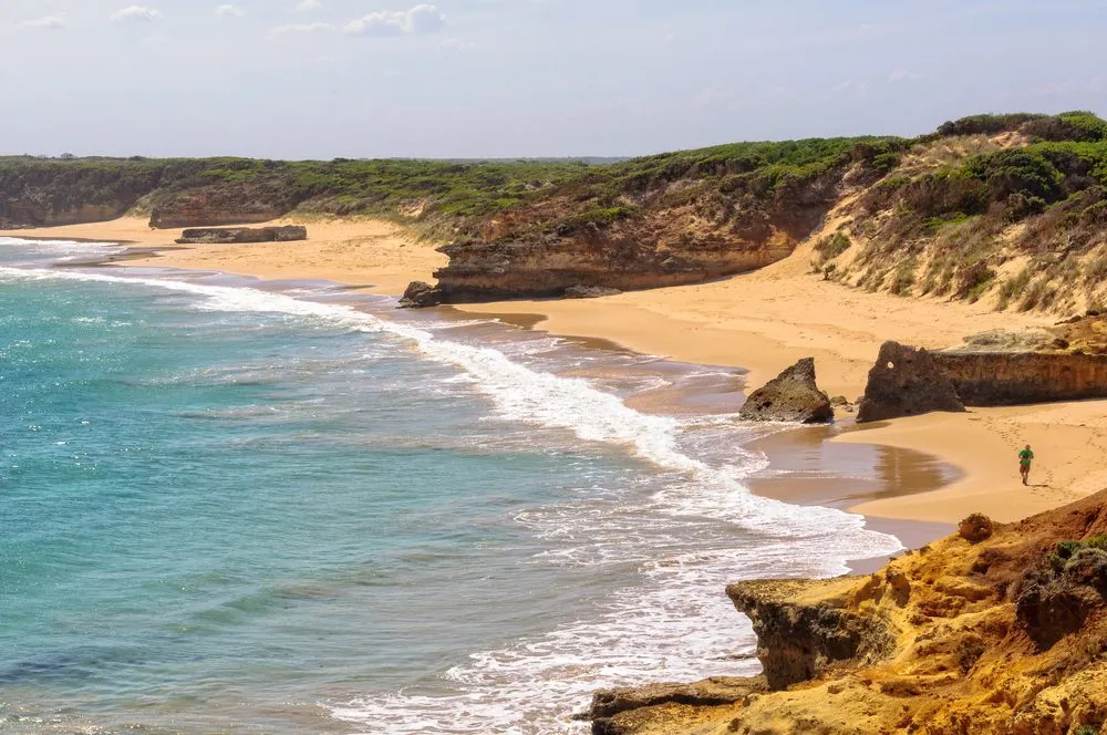Sunset at Bay of Martyrs – dramatic cliffs and sea stacks make it a must-see hidden gem Great Ocean Road.