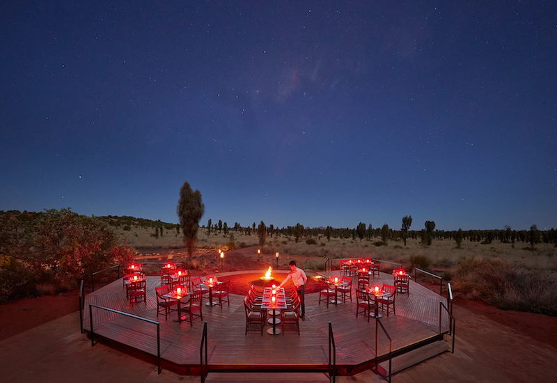 Luxury eco-tent with view of Uluru and night sky in Northern Territory