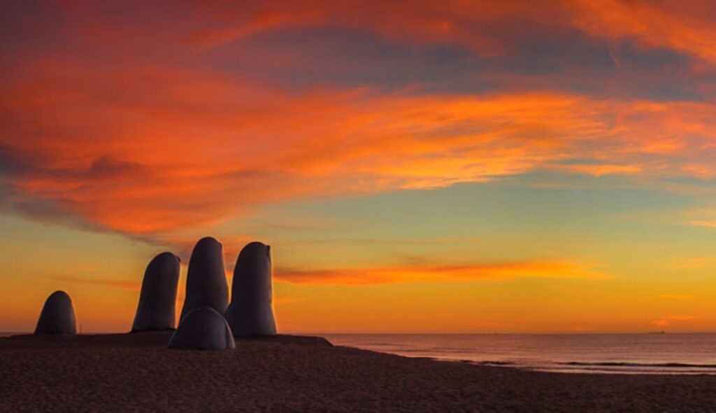 Punta del Este Travel Guide – Playa Brava and the iconic Hand sculpture at sunrise