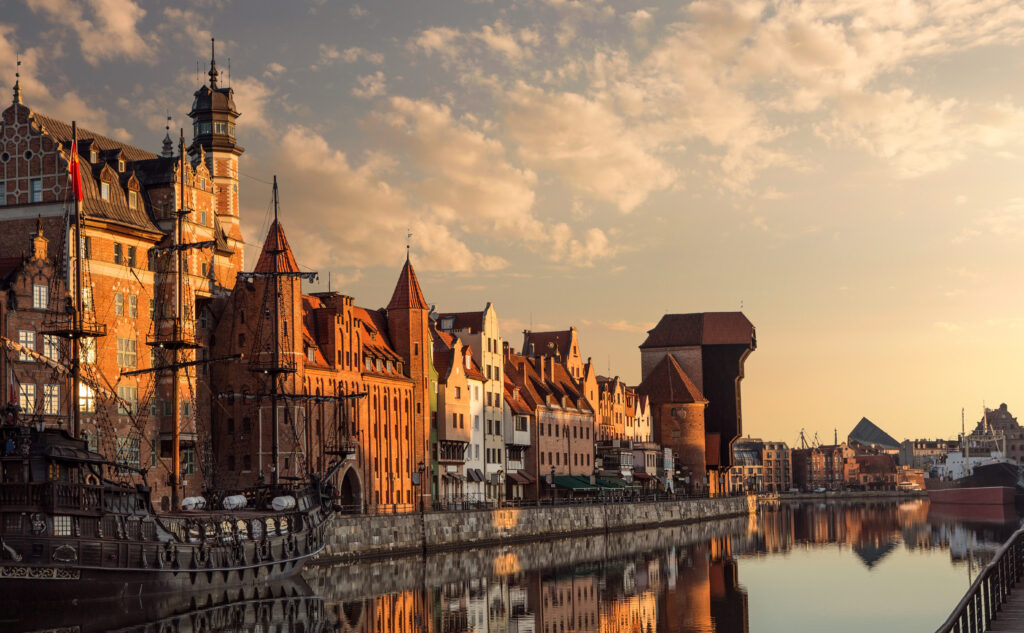 Gdańsk Poland travel guide – panoramic view of the historic old town and Motława River at sunset