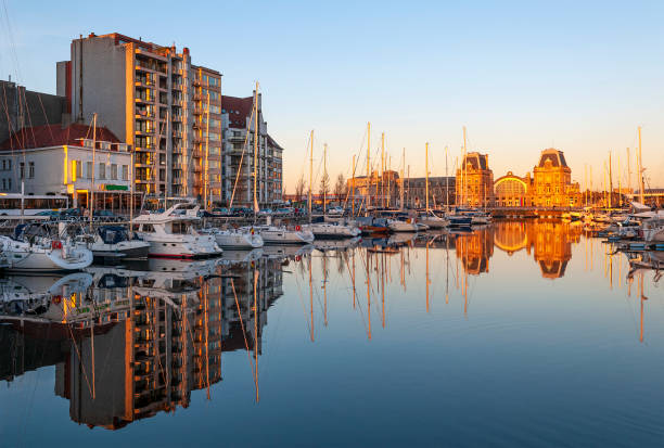 Sunset over the beach promenade in Ostend, capturing the coastal charm highlighted in the Ostend Belgium travel guide